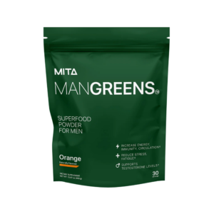 Man Greens supplement powder in a glass.